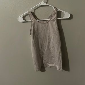 White tank top, okay condition, worn a little